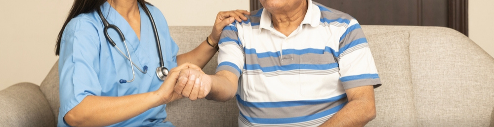 A Nurse Monitoring an Elderly's Health